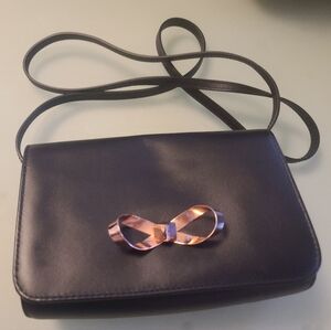 Womens Black Leather Crossbody Bag with Rose Gold Bow Accent
